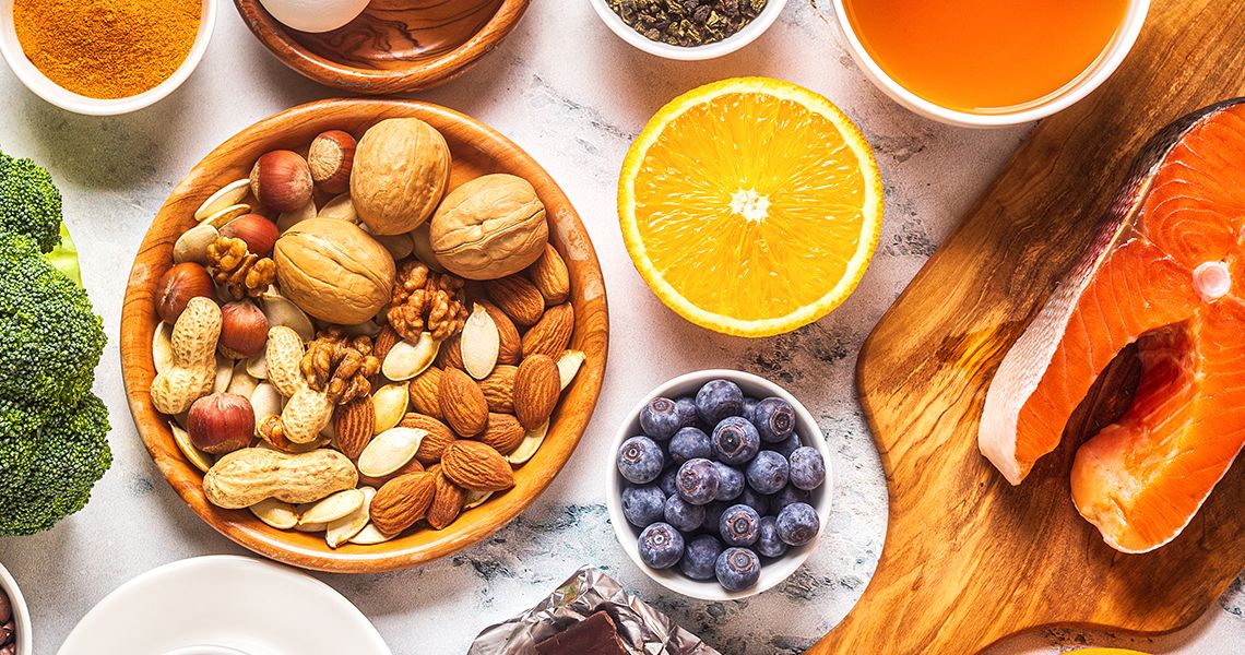 overhead photo of a marble countertop with healthy food on it