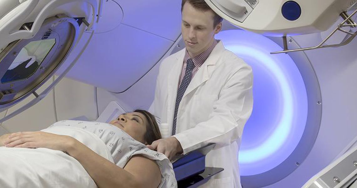 doctor prepping woman for a scan