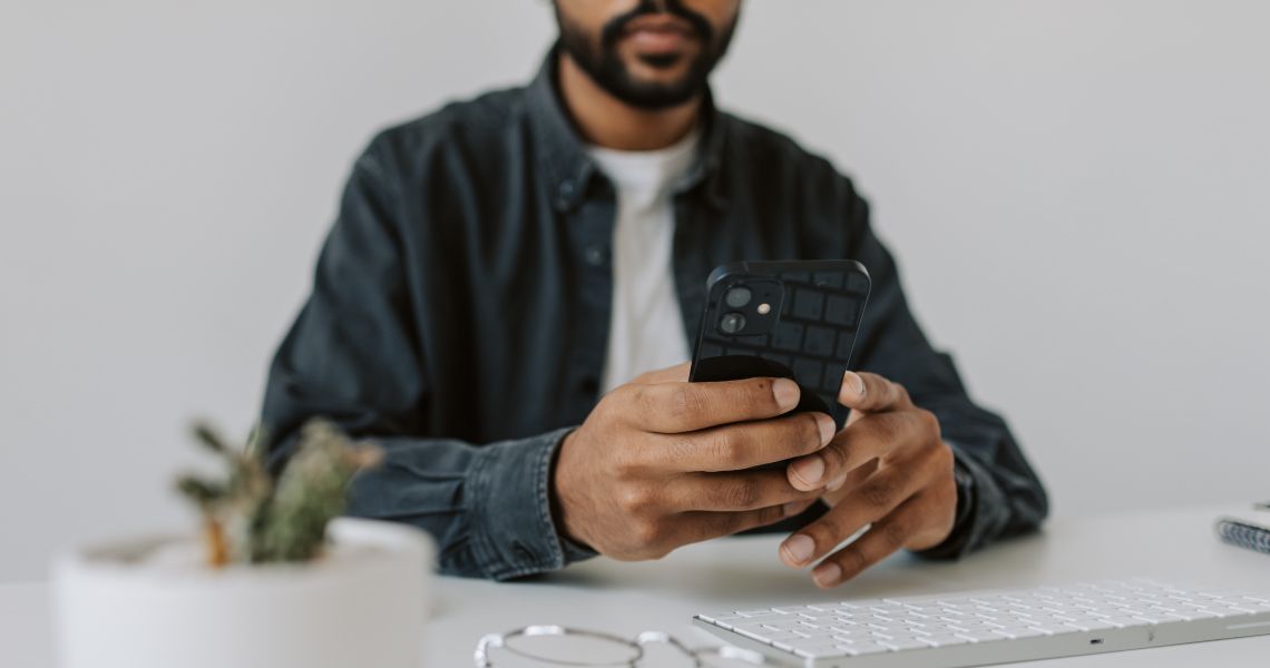 man using cell phone